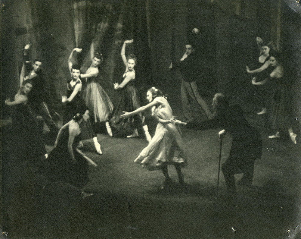 Black and white photo of dancers on stage